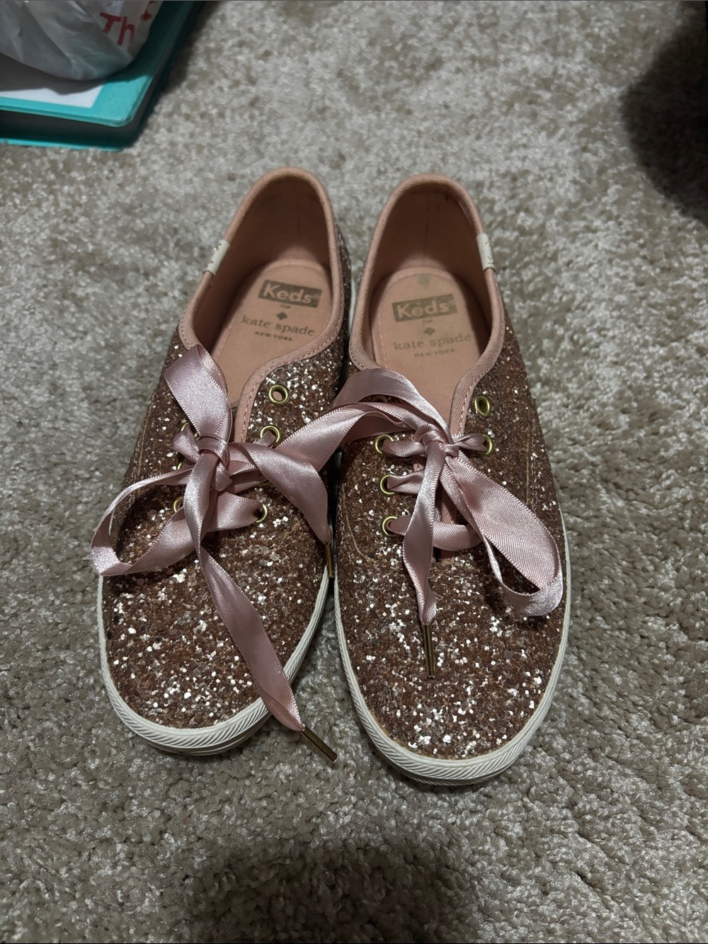 kate spade Women’s Rose Gold Glitter Ribbon Lace Sneakers
